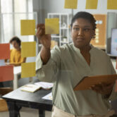 front-view-woman-working-with-post-its
